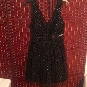 Blondie Nites Black Dress with Gold Accents